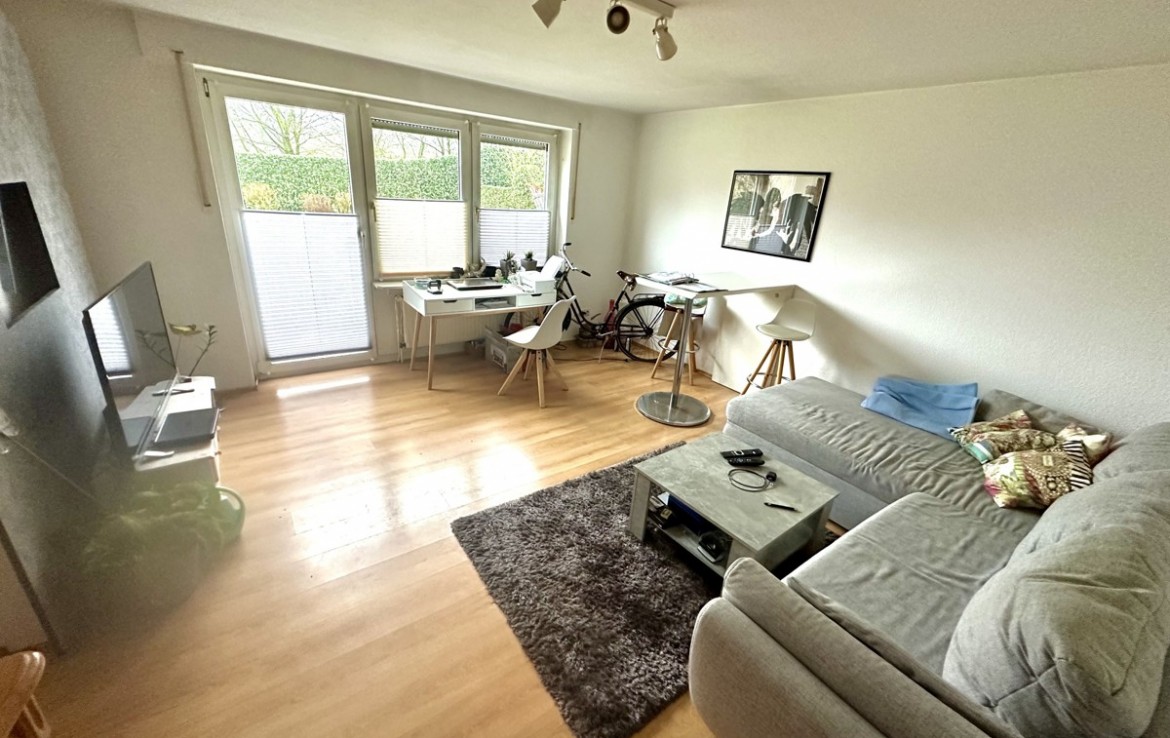 Souterrainwohnung mit Terrasse und Garten! - Foto 4